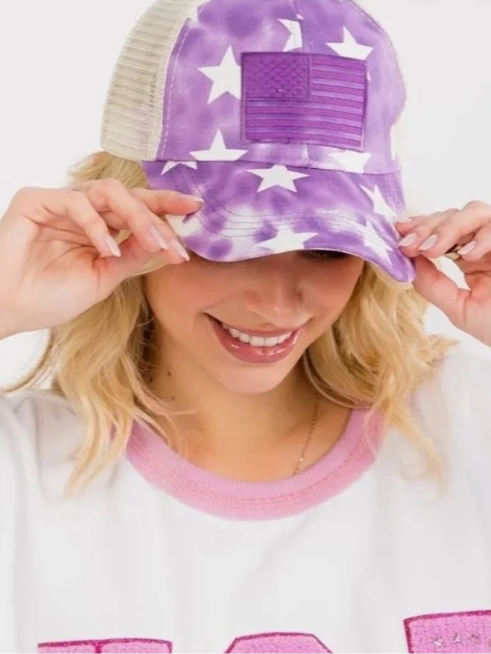 CC brand Women’s stars with American flag Trucker Hat purple background